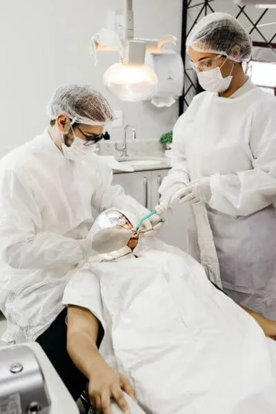 Doctors operating surgery on patient